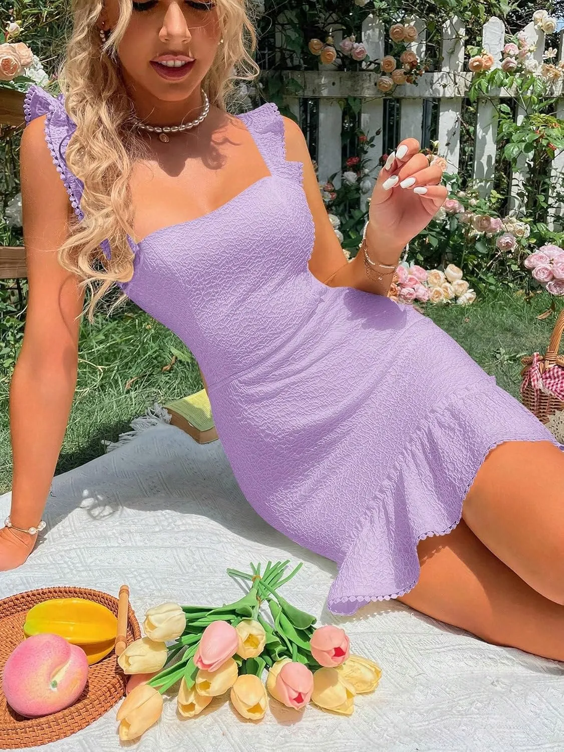 WDIRARA Women's Boho Backless Knot Ruffle Hem High Waist Trim Textured Mini Dress